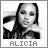 Black-and-white pixelated image of a person with long dark hair, wearing a dark top, with the name 'ALICIA' displayed below in pixelated text.