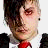 A 48x48 pixel buddy icon featuring a person with dark hair and red eyes in two slightly different poses, wearing a black jacket over a white shirt with a red tie, accompanied by the text "frank" below.