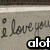 A static image shows handwritten text 'i love you' with a bold black-and-white 'alot' overlay on a textured background.