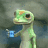 Green lizard-like creature holding a blue object against dark background with bright pink overlay text.