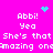 Bright pink background with white pixelated text and cyan animated symbols; repeated phrases 'Abbi! Yea She's that Amazing one' appear in two mirrored