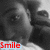 Black-and-white photo of two people with red text overlays; one says 'Smile', the other 'Beautiful' in a different frame.