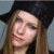 A 50x50 pixel animated contact sheet showing two frames of a buddy icon with a person wearing a black hat and long brown hair, featuring text overlays in the second frame.