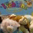 Pixelated image with pink background text reading 'Webkinz Are Lovee!' and blurred anime-style character on left.