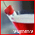 Pixelated image of a red heart-shaped object above a glass filled with red liquid, bordered by a solid red frame.