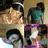 Pixelated static image of multiple figures in a grid layout with varied clothing colors and poses.