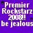 Purple background with repeated white text 'Premier Rockstarz 2008!!' and 'be jealous', small black stars scattered throughout.