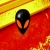 Pixelated icon shows a black helmeted figure with orange accents against a red and yellow gradient background.