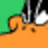 Pixelated image with green and orange sections, metallic objects on top of an orange surface, and pixelated text reading 'your dispick- able' in orange letters.