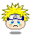 Pixelated character head with spiky yellow hair, blue eyes, and a silver forehead protector showing a metal symbol.