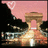 Pixelated image with pink background, heart shape, and abstract forms in brown, black, and white tones.