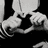 Animated sequence showing a person forming a heart shape with hands, holding a key with 'I LOVE YOU' text, and displaying a white outline of a heart on dark background.