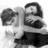 A four- shows a grayscale image of two people embracing, a color close-up of one person's face with another hand above their head, the word 'twilight' in light blue text on black background, and a color close-up of two people facing each other
