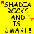 Yellow background with black text repeating 'SHADIA ROCKS AND IS SMART!!' and scattered red/orange stars, with a gray rectangle in the bottom-right corner.