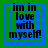 Four identical pixelated text arranged in a , each displaying 'im in love with myself!' within nested blue and green squares