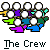 Pixelated group of figures in a with white circular heads, colored bodies, and text below reading "The Crew"