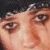 A 50x50 pixel animated contact sheet showing two frames of a close-up facial expression with visible skin texture and partial hair, displayed on a gray background.
