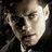 A static image of a person's face with a serious expression, partially visible on the left side of a , with text reading "SKY CAPTAIN .COM" on the right