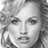Grayscale pixelated portrait of a person with shoulder-length hair, visible facial features including eyes, nose, and mouth, rendered in low-resolution 48x48 pixels with dithering effects.