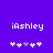 Pixelated white text 'iAshley' on solid purple background with two of five pixel symbols below, one showing a single purple symbol among four white ones