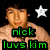 Pixelated image of a person with dark hair and light skin, wearing a beige shirt against black background with white stars.