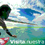 Animated sequence showing a surfer on a wave transitioning to a digital camera against a blue sky background with text reading 'Visita.nuestra Photo gallery' at the bottom.