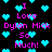 Black background with repeating cyan heart shapes and pink text reading "I Love Dylan Mick So Much!" in pixelated font.