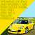 Yellow sports car with dark roof on road, surrounded by greenery and blue sky.