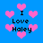 Blue background with pink pixelated hearts and black text reading "I Love Haley" in four repeated sections.