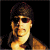 A pixelated contact sheet showing two frames of an animated icon with a person on the left and green text on the right against a dark background.