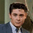 A pixelated image of a person in a suit with red text overlay reading 'hottie mc hothot' on the right side.