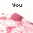 Pixelated image with text 'You make me blush' above a pink and white patterned background featuring a red shape.