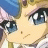 Pixelated anime-style character face with blue eyes and blonde hair on left, black background with white text "Anime IM" and signature on right.