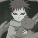 Anime character with spiky hair holding a round plush toy, static pose