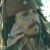 A pixelated image of a person with long hair and a hat, surrounded by repeated text reading "Thats the hottest I've ever seen" in black and red.