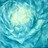 A pixelated static image with a central light blue and white gradient surrounded by darker blue and teal tones in a circular pattern.