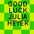 Green and yellow pixelated background with black text reading GOOD LUCK JULIA HEYER in four lines, displayed as two identical side-by-side
