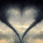 A heart-shaped composition formed by a dark outline against a gradient background of light gray and beige tones.