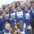 Group of people in blue uniforms holding a trophy, with one frame showing "CKA" text overlay.