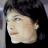 A 48x48 pixel buddy icon featuring a side-profile portrait of a person with dark hair on the left and bold red text reading "HELL BOY 4.2.04" on the right against a pinkish-red background.