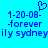 Pixelated blue text on cyan background with heart symbol above, showing date and name in two