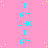 Cyan text reading "I AM WHO I AM" repeats in a pattern on a pink background with scattered yellow dots, partially obscured by a gray rectangle