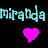 Pixelated cyan text "miranda miranda" above a solid pink heart on black background in static frame.