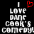 Pixelated text reads 'I LOVE DANE COOK'S COMEDY!' with a red heart symbol above the first 'I' on black background.
