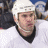 Pixelated image of a hockey player in white jersey with black collar, wearing white helmet, next to text "Brian Holzinger #15" and Pittsburgh Penguins logo.