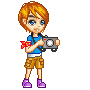 Pixel art character with orange hair, blue shirt, brown shorts, purple shoes holding a camera; red bow on left shoulder.