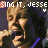 A repeated of identical pixelated images showing a person with light brown hair and dark clothing, each overlaid with text reading "SING IT. JESSE SING IT." in white and red lettering
