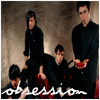 identical figures in black attire holding red objects, with changing text beneath them