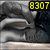 Pixelated image with yellow digital numbers 8307 at top center, red text 'let's get dirty!' at bottom right, and grayscale background elements.