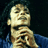 A pixelated contact sheet of two animated frames showing a person in blue clothing with hands near the face on the left and green text reading "Original Icons .com" on the right against a dark background.